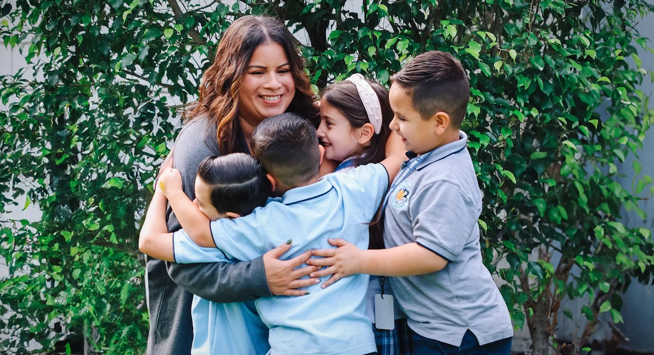 An Honored Honoree Teacher with her students An Honored Honoree Teacher with her students